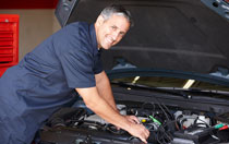 Guy working on car